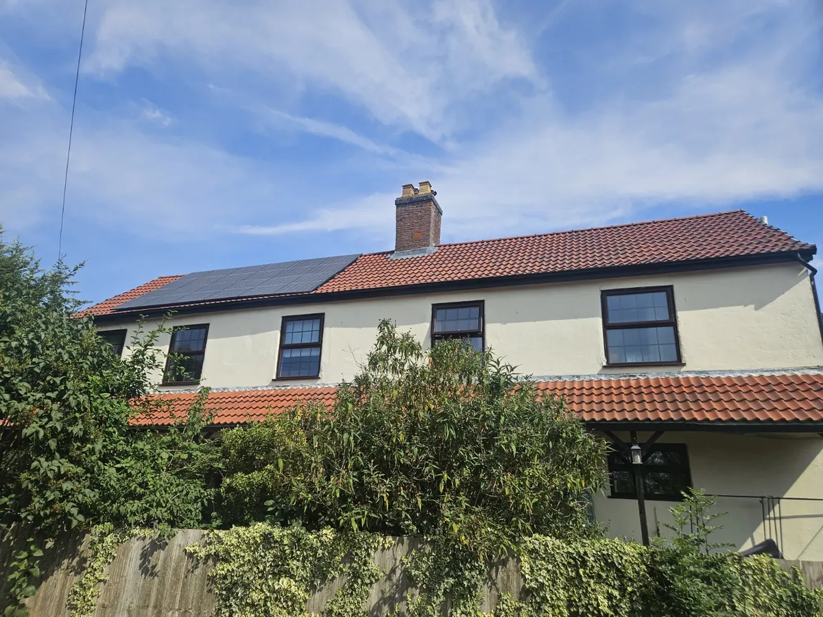Existing roof-mounted solar panels on an anonymised residential property